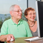 Couple using computer